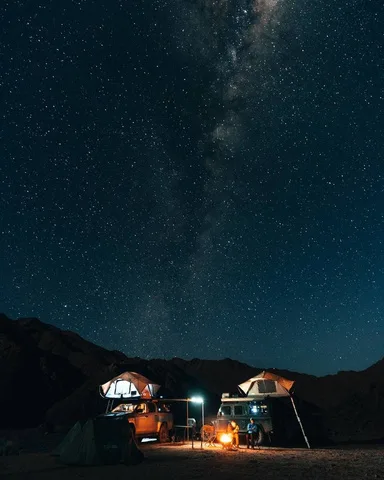 Rooftop-tent camp under the Milky Way